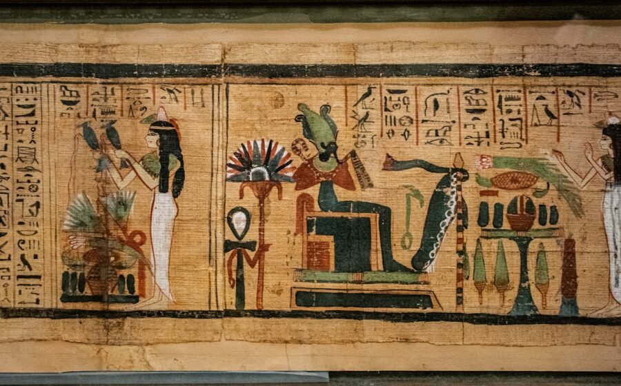 Ancient Khemetic papyrus with figures and hieroglyphic text, representing manuscript study; not held by the Khemetic Aboriginal Library
