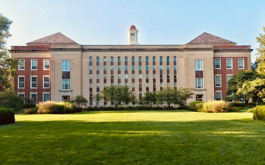 An illustrative college campus building accompanying a story about higher education costs