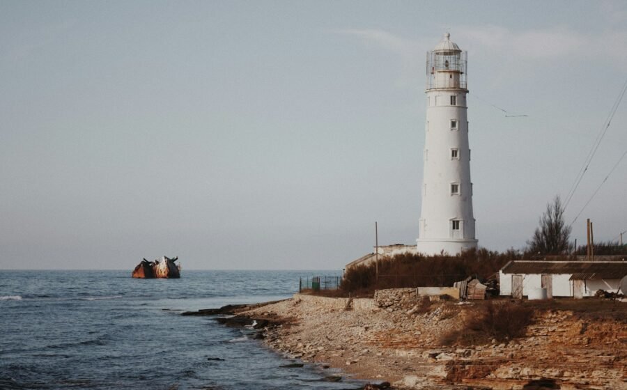 Contemporary lighthouse at the water; illustrative, not ancient Alexandria