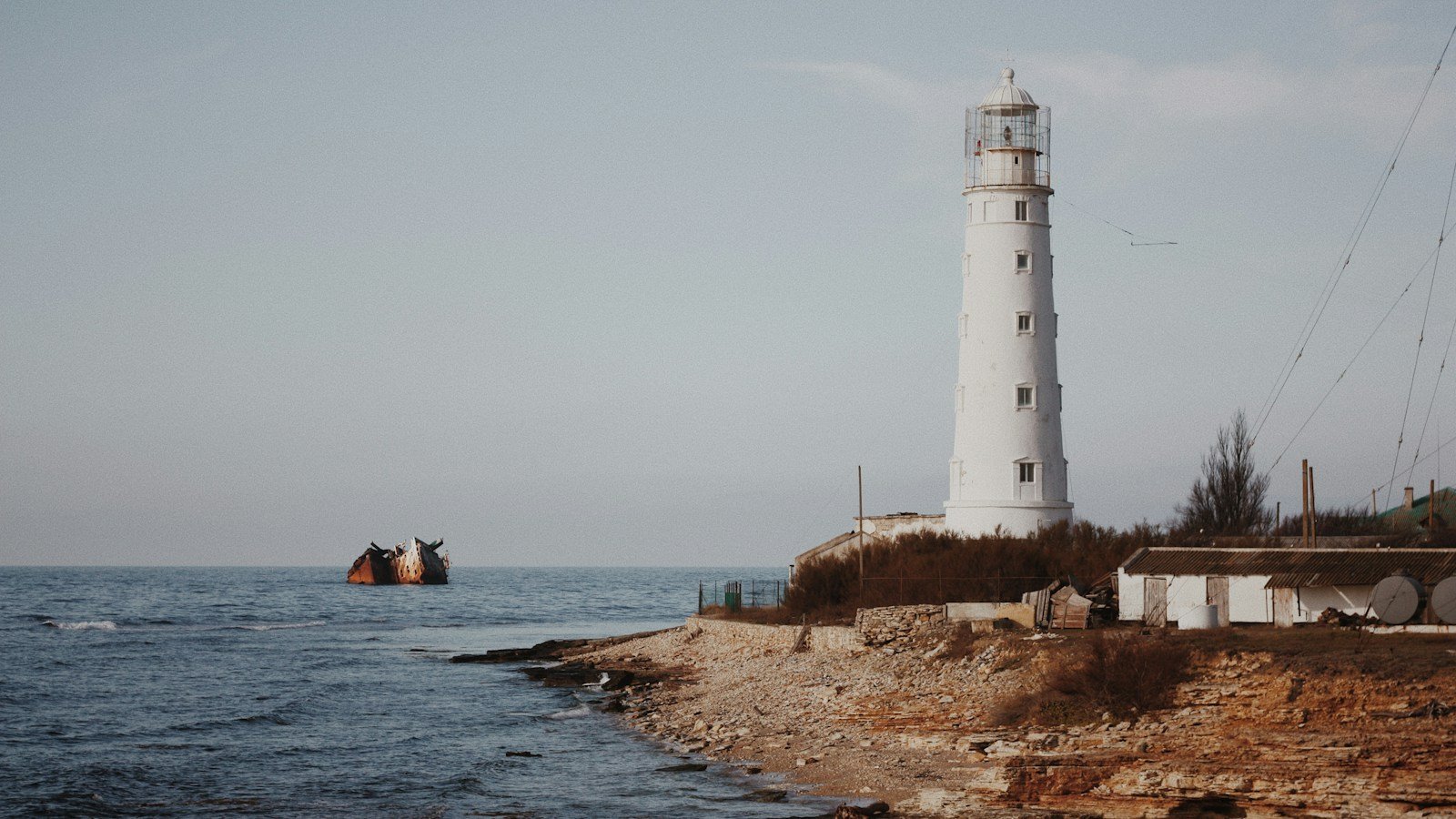 Contemporary lighthouse at the water; illustrative, not ancient Alexandria