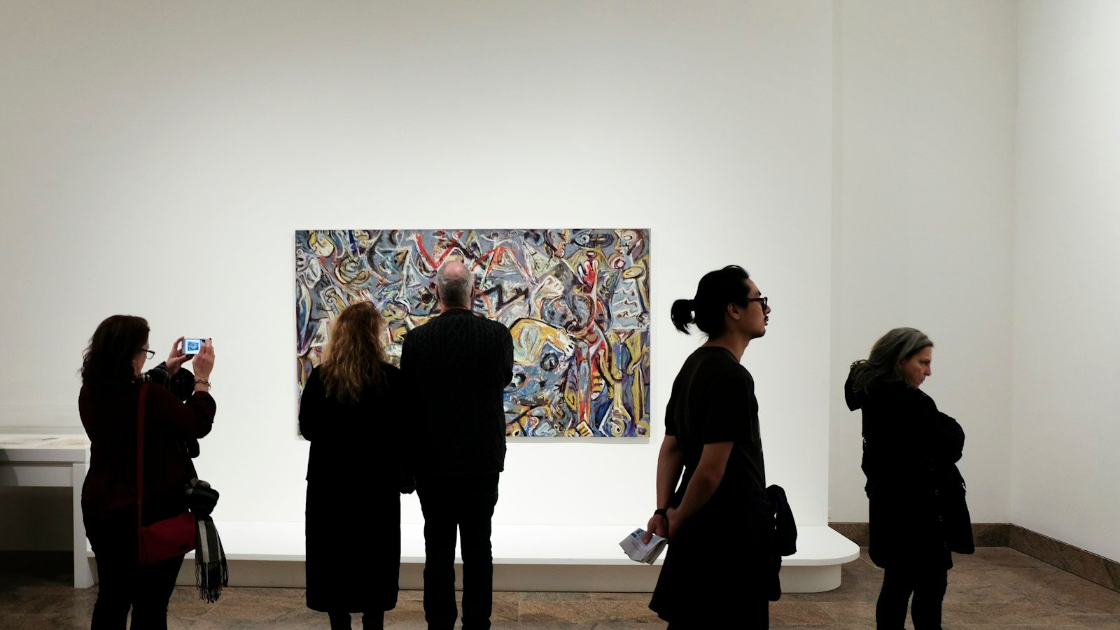 Visitors in an art gallery, illustrating coverage of Frieze London; not an image taken at Frieze 2026