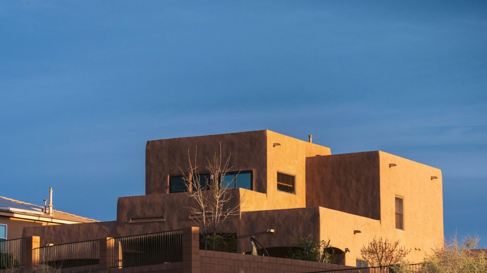 Illustrative Southwestern desert architecture photograph, not a depiction of the proposed Sedu Peru development