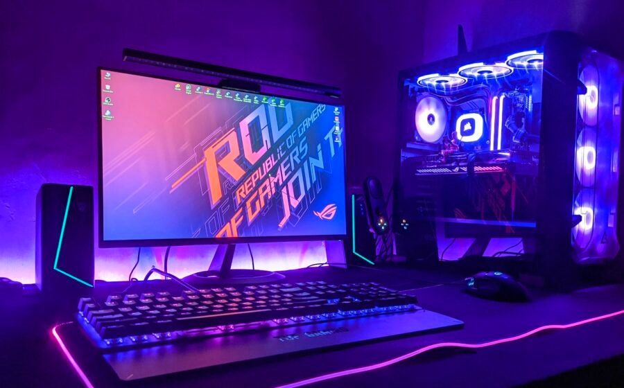 Colorfully lit video gaming setup illustrating independent RPG development; not a screenshot of Ancestral Legends