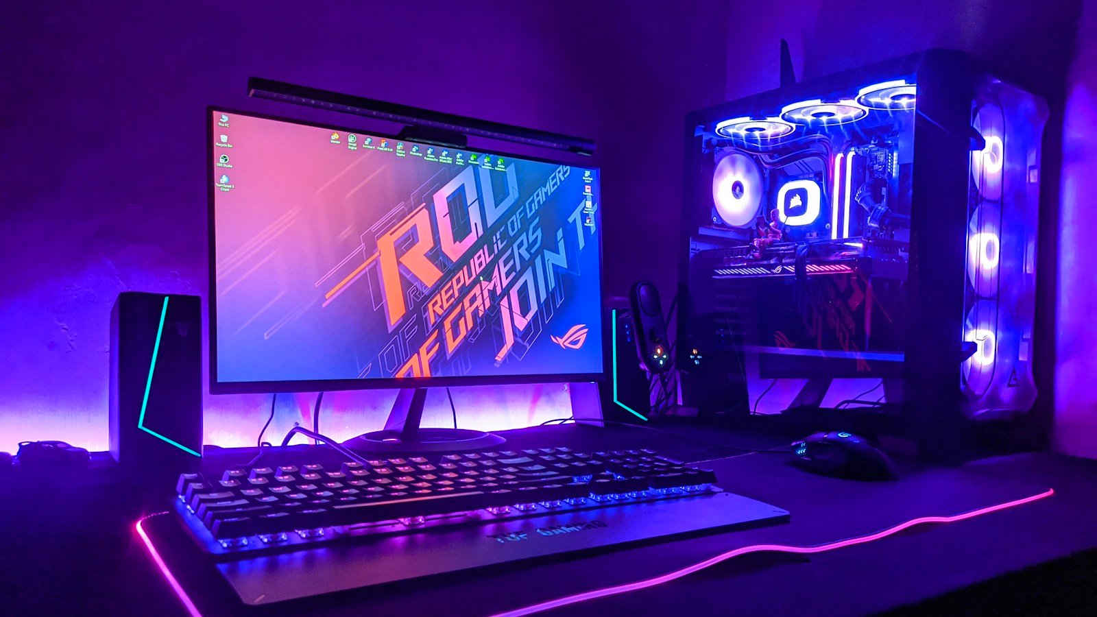Colorfully lit video gaming setup illustrating independent RPG development; not a screenshot of Ancestral Legends