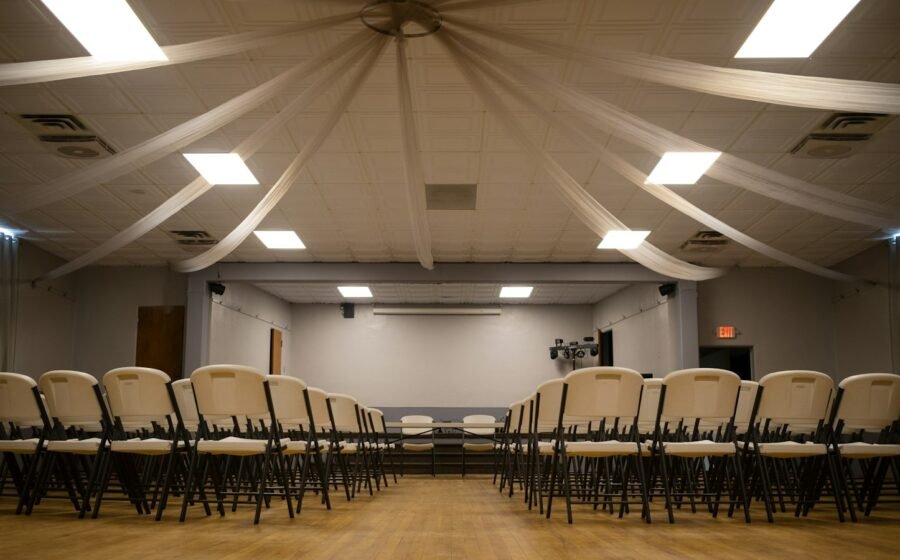 Chairs arranged in an event meeting room; illustrative, not a Khemetic Nation meeting
