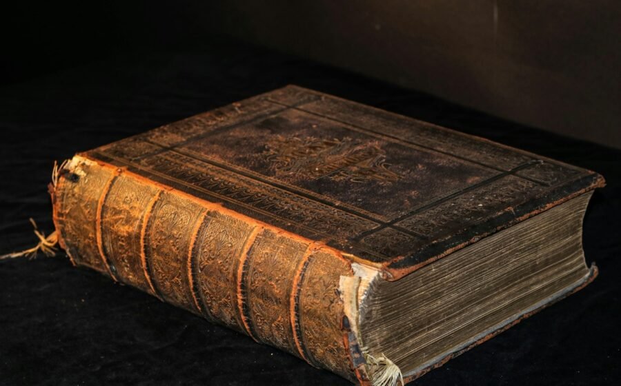 A bound book on a table, illustrating preservation of written records