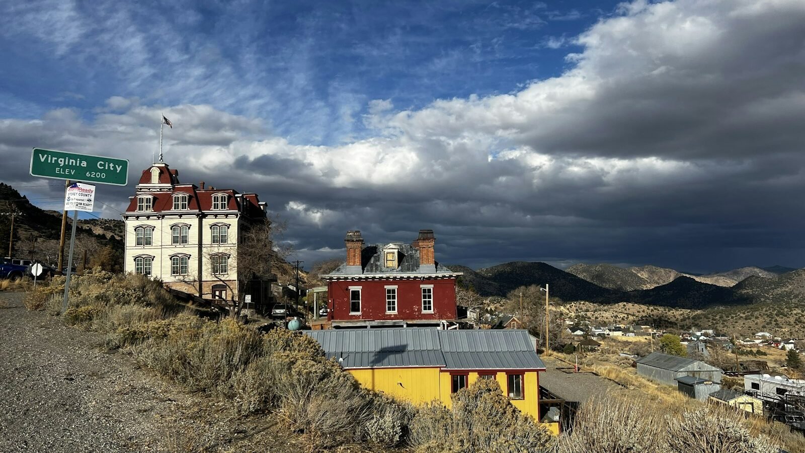 Historic buildings in Virginia City, Nevada, under a cloudy sky