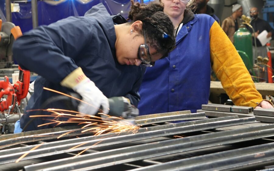 Illustrative vocational training workshop with people developing practical job skills